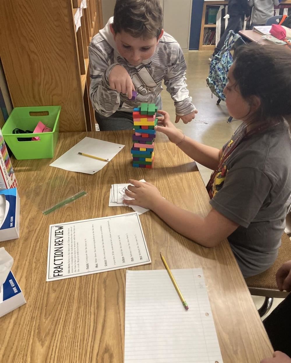  Holden and Langley use blocks for a fraction review